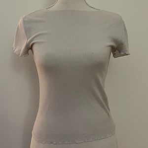 White T with ruffles neck and sleeves